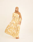 Noor champagne feather-print dress, skirt in movement
